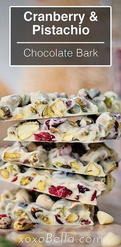 cranberry and pistachio chocolate bark is stacked on top of each other