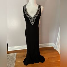 Beautiful Mieka Black Tie Dress With Sliver Beading. Never Worn. Size 8. Formal Beaded V-neck Evening Dress, Beaded Evening Dress For Night Out, Beaded Floor-length Dress For Night Out, Elegant Beaded Black Evening Dress, Elegant Black Beaded Evening Dress, Elegant Beaded Prom Dresses, Sleeveless Beaded Formal Dress, Formal Beaded Sleeveless Dress, Formal Sleeveless Beaded Dress