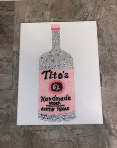 there is a sign that says tito's on it