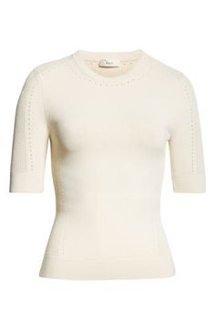 Intricate pointelle stitching defines the sleeves, neckline and sides of this ultrasoft top. Crewneck Short sleeves 63% viscose, 36% nylon, 1% elastane Dry clean Imported Elegant Fitted White Knit Top, Classic Beige Pointelle Knit Tops, Fitted Classic Pointelle Knit Sweater, Cream Pointelle Knit Top For Layering, Fitted Cream Sweater, Elegant Stretch Pointelle Knit Top, Elegant Cream Crew Neck Top, Fitted Off White Knit Top, Elegant Open Knit Top For Layering