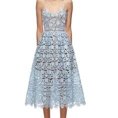 The Dress Features Delicate Spaghetti Straps And The Front Neckline Is Framed With A Scallop Edge. The Skirt Has A Full, Pleated Silhouette And Features A Hand-Cut, Raw Lace Hemline. The Dress Fastens Neatly At The Plunging Back With An Exposed Zip And Contrast Lining. Lined With Nude Stretch-Jersey To The Mid-Thigh, Then Falls To A Sheer Hemline. Us Size 2 Uk Size 6 Pre-Owned But Looks Brand News Midi Evening Dress, Blue Floral Midi Dress, Crochet Midi Dress, Black Lace Midi Dress, Cobalt Blue Dress, Geometric Lace, Self Portrait Dress, Scallop Edge, Ruched Midi Dress