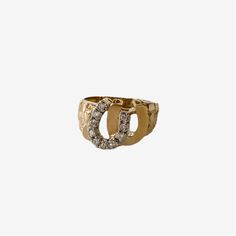 DOUBLE YOUR LUCK WHAT IT IS: 14k double gold horseshoe with diamond detail WHY IT'S SPECIAL: Horseshoes are an iconic addition to your ring stack, especially when they bring old-school vibes Buying vintage is always good for the environment GOOD TO KNOW: 14K Gold Diamonds 6.4 grams ﻿size 7 WHY WE LOVE RECREO: This collection of estate, vintage and antique rings from around the world delivers something unique and distinctive—we love being different. Plus buying vintage is always good for the envi Vintage Gold Horseshoe Jewelry, Elegant Gold Horseshoe Rings, Elegant Yellow Gold Horseshoe Rings, Diamond Horseshoe Ring For Anniversary, Horseshoe Diamond Ring For Anniversary, 14k Gold Horseshoe Ring, Gold Horseshoe Diamond Jewelry, Classic Horseshoe Shaped Anniversary Rings, Gold Diamond Horseshoe Jewelry