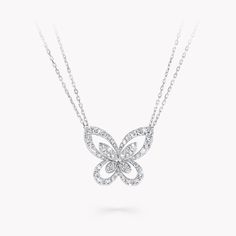 A tender depiction of a butterfly with wings outstretched, outlined in scintillating pavé diamonds, the large Butterfly Silhouette pendant in white gold perfectly captures the delicate beauty of one of nature’s most captivating creatures. Presented on a white gold chain, clusters of pavé stones form a second butterfly silhouette in the centre, bringing a subtle sense of three-dimensionality to the pendant. Butterflies have played a prominent role in the history of the House. An enduring source o Graff Butterfly, Diamond Shaped Engagement Ring, Butterfly Silhouette, Graff Diamonds, Pear Shaped Diamond Ring, Round Diamond Earrings, Triple Hoop Earrings, Diamond Earrings Studs Round, Diamond Butterfly