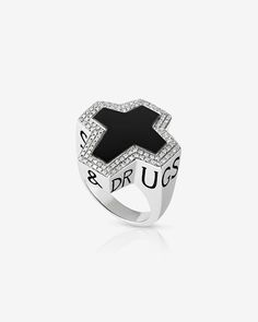 The original Men's collection became instantly renowned for blazing a trail, unashamedly made for men with big attitudes. As Stephen once said, "a statement ring sorts the men from the boys". The Sex & Drugs & Rock & Roll Ring is a defining spirit to the Men's collection; crafted in Sterling Silver with a central black Onyx cross and White Diamond pavé. Style Code: SR0017 Unsure on your ring size, please use our ring sizer. Broken Book, Country Jewelry, Stephen Webster, Onyx Ring, Rock Roll, Fine Jewellery, Ring Collections, Womens Engagement Rings, Wedding Men