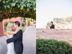 a bride and groom standing on a brick wall in front of greenery at their wedding