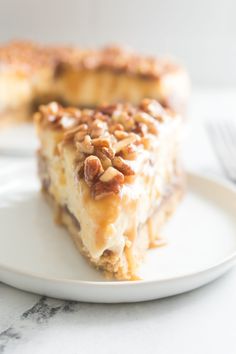 a slice of pecan pie on a white plate