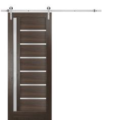 an open wooden door with metal bars on the top and bottom, against a white background