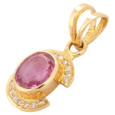 Pink Sapphire Pendant in 18K Gold with Diamonds. It has a oval cut sapphire studded with diamonds that completes your look with a decent touch. Pendants are used to wear or gifted to represent love and promises. It's an attractive jewelry piece that goes with every basic outfit and wedding too. PRODUCT DETAILS :- Material - 18K Solid Yellow Gold Gemstone - Pink Sapphire Stone Weight - 1.56 ct Stone Shape - Oval Stone Size - 8 x 6 mm Diamond Weight - 0.11 ct Diamond size - 0.9 mm Diamond Pcs - 14 Gross Weight - 2.305 Grams Setting - Bezel setting We can customize the Gold Gemstone Pendants according to your specification. Go to our Storefront Page for more updates and click on the follow button to never miss out on our newly added jewelry collection. All our jewelry products are stamped acc Pink Sapphire Pendant, Sapphire Studs, Gemstone Pendants, Sapphire Pendant, Sapphire Stone, Oval Stone, Diamond Sizes, Gold Studs, Solid Yellow