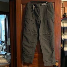 Men’s North Face Zip Off Hiking Pants, Very Thick And Durable And In Perfect Condition! Never Worn! Comes With Built In Belt, Plenty Of Breathable Pockets. Loose Baggy Fit Utility Work Pants For Outdoor Activities, Casual Cargo Pants With Side Pockets For Camping, Casual Cargo Pants For Camping, Utility Bottoms With Side Pockets For Camping, Utility Camping Bottoms With Side Pockets, Tapered Leg Outdoor Pants With Belt Loops, Outdoor Tapered Leg Pants With Belt Loops, Outdoor Cargo Style Work Pants, Relaxed Fit Hiking Pants With Pockets