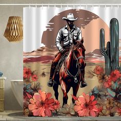 a shower curtain with an image of a cowboy riding a horse and cactus in the background