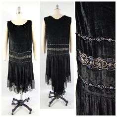 "(Please scroll down to read the entire listing.) For your consideration is a gorgeous 1920s velvet \"flapper\" dress for evening and formal wear.  This Dress Features:  Buttery soft black velvet Uneven handkerchief hem with black georgette trim Train - longer in the back than in the front Multi-panel hem (see last photo for structure) Drop waist with rows of prong-set rhinestones in blue and silver and blue moonstone beads Gathered at the shoulders No label Dress Measurements:  Bust -  42\" Waist - 40\" Seam across hips - 41\" Length (from shoulder) - 55\" at the longest part of the tail, 45\" at the shortest point.  ● Condition: Excellent. Less than typical wear for a garment of its age. Scattered small holes/a repair/small tear in the georgette at the very bottom. This fabric is very de 1920 Dress, 1920s Flapper Dress, Blue Moonstone, Moonstone Beads, Handkerchief Hem, Dress Measurements, Drop Waist, Dress Clothes For Women, Printed Skirts