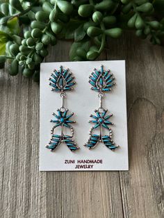 Zuni Made Turquoise Sterling Silver Dangle Earrings. It measures 2 1/2 inches long and just over 3/4 of an inch wide. Signed by artist and stamped sterling silver. Thank you for checking out my store, if you have any questions please contact me!! Exported By ExportYourStore :) SKU:448021992901_E43F* Unique Blue Earrings Stamped 925, Silver Dangle Earrings, Sterling Silver Dangle Earrings, Tucson Az, Etsy Earrings Dangle, Turquoise Sterling Silver, Tucson, Sterling Silber, Etsy Accessories