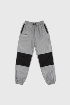 Official presents the RFLCTIV 3M Silver Reflective Track pants Features: 3M Silver reflective swishy track pant "OFFICIAL" logo hit on front right leg Reflective Paracord Drawstring on waist Elastic Waist and Cuffs Dual back pockets *We recommend ordering 1 size up from your usual fit. Nylon Shorts, Adidas Skateboarding, Track Pant, Shorts Cargo, Dc Shoes, Paracord, Suits You, Cargo Shorts, Track Pants