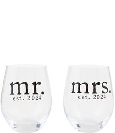 two wine glasses with the names mr and mrs on each one, sitting side by side