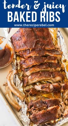 the best tender and juicy baked ribs in foil with dipping sauces on top for dipping