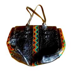 Rare Colleen Cordero Beautiful Black Leather Tote With Stuffing And Orange And Teal Aztec Decoration. Perfect Large Size For Travel Or Everyday Use. See Photos For Measurements. 17 Inches Across 13 Inches From Top To Bottom. Rare Style, No Longer Available. Brand New Condition, Spotless Inside And Out, Never Used. See Photos. Multicolor Bohemian Satchel For Shopping, Bohemian Multicolor Satchel For Shopping, Multicolor Leather Pouch Shoulder Bag, Black Leather-backed Crossbody Satchel, Black Leather Crossbody Satchel, Multicolor Hobo Bag With Detachable Strap, Multicolor Leather Tote Hobo Bag, Multicolor Leather Hobo Bag Tote, Leather Multicolor Tote Hobo Bag