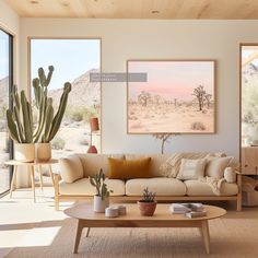 a living room filled with furniture and large windows next to a desert landscape on the wall