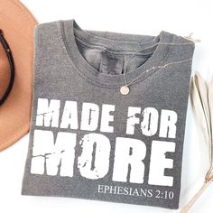 Our handmade Christian t-shirts are crafted from the highest quality materials for an ultra-soft and comfortable wear. Our trendy Christian shirts ship the same or next business day and are printed using an eco friendly water based ink that is not only safe for you but also safe for the environment! 💖  Bold and Bloom Co. offers trendy items for any occasion! Our shirts are crafted from the highest quality materials for ultra-soft and comfortable wear. Most importantly, all of our items are prin Inspirational Crew Neck Shirt With Relaxed Fit, Inspirational Long Sleeve Cotton T-shirt, Inspirational Cotton Crew Neck Shirt, Inspirational Crew Neck Cotton Shirt, Inspirational Crew Neck Top As Gift, Soft-washed Crew Neck T-shirt As Gift, Trendy Items, Christian Tshirt, Bible Verse Shirt