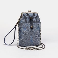 Enhance your style and functionality with this improved Phone Case design! Now featuring mini rings on both sides of the clasp, this bag comes with a convenient 60" detachable chain with hooks, allowing you to effortlessly switch it to a crossbody bag for ultimate versatility. Crafted from a combination of burnout velvet, cotton floral canvas, and a sturdy brass clasp with a double kiss lock, this Phone Case is part of my classic and durable clasp collection. Handmade with attention to detail, i Elegant Coin Purse With Snap Closure For Everyday, Blue Mobile Phone Evening Bag, Vintage Shoulder Bag With Metal Hardware For Daily Use, Elegant Coin Purse With Cell Phone Pocket, Elegant Handheld Pouch With Cell Phone Pocket, Vintage Phone Bag With Adjustable Strap For Daily Use, Vintage Crossbody Phone Bag For Everyday Use, Elegant Blue Shoulder Bag With Cell Phone Pocket, Vintage Rectangular Bag With Metal Hardware