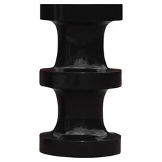 a black vase with three sections on it