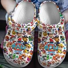 Paw Patrol Cartoon White Color Clogs Shoes Casual Multicolor Round Toe Mules, Casual Closed Toe Clogs With Rubber Sole, Multicolor Clogs With Rubber Sole And Round Toe, Fun Synthetic Clogs With Rubber Sole, Casual Multicolor Clogs With Rubber Sole, White Comfortable Synthetic Clogs, White Non-slip Round Toe Clogs, Fun White Slip-on Clogs, White Slip-on Synthetic Clogs