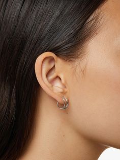 Say hello to our bestselling double hoop earrings in silver. These silver hoops add the coolest detail to your look as they wrap around your ear, giving you the illusion of two piercings in one. Pair these double hoop earrings our Heritage silver necklace for a classic silver ensemble. • Shining rhodium plating on recycled sterling silver • Wear anywhere, pair with anything • Delicate style, please handle with care How to wear: place thinner post through piercing. Turn earring approximately 2-3 Two Piercings, Daily Earrings, Double Piercing, Second Piercing, Double Hoop Earrings, Letter Necklace, Recycled Sterling Silver, Silver Hoops, Cute Earrings