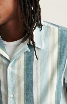 Softly brushed oxford cloth woven from cotton and hemp keeps you feeling casual and comfortable in a camp shirt patterned in bright, sunny stripes. Front button closure Convertible collar Short sleeves 73% cotton, 27% hemp Machine wash, tumble dry Imported Mens Knit Sweater Pattern, Outfits With Striped Shirts, Woven Shirts, Mens Knit Sweater, Mens Smart Casual Outfits, Check Shirt Man, Convertible Collar, Smart Casual Men, Summer 2025