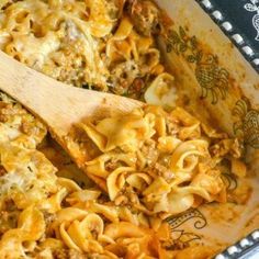 a casserole dish with pasta and meat in it, ready to be eaten