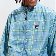 Brand New, With Tags, Never Been Used. Lightweight With A Uo-Exclusive Pattern, The Livingston Track Jacket From Fila Offers Poly Construction With Allover Plaid Detailing And Branded Hits At Zipper + Chest Icon. With A Zip Front Closure That Goes From Cinched Hem To Stand-Up Collar, This Jacket Is Complete With Cinched Elastic Cuffs And Front Slip Pockets. Material - Nylon Approximate Measurements - Chest: 22” Length: 26” Blue Nylon Track Jacket For Spring, Casual Blue Nylon Track Jacket, Blue Nylon Track Jacket For Fall, Fila Jacket, Blue Jacket Men, Fila Vintage, Varsity Letterman Jackets, Heavy Jacket, Letterman Jacket