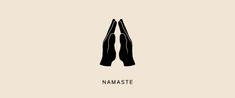 two hands holding each other with the words namaste above them