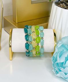 Elevate your wrist game with our Skipping Stones Bracelet Set in green – a vibrant and boho-inspired collection featuring 5 Row Ugly Stone Beaded Bracelets. This stretch bracelet set is perfect for those who love to embrace the beauty of natural stones in a trendy and eclectic design. Stone Beaded Bracelets, Skipping Stones, Stacking Bracelets, Black Friday Christmas, Beach Birthday, Wrist Game, Colored Stone, Eclectic Design, Bracelet Stack