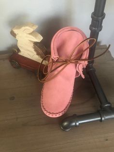 These handmade moccasins will not disappoint.  A pretty pink suede handcrafted into a quality pair of moccasins.  They are also lined in leather (ideal for grounding).  This can be substituted for a faux Sherpa pad for added warmth and comfort. Pink Leather Moccasins With Round Toe, Handmade Moccasins, Earthing Grounding, Tory Burch Miller Sandal, Pink Suede, Pretty Pink, Moccasins, Soft Pink, Pretty In Pink