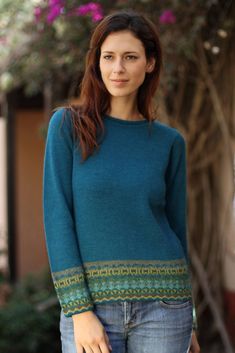 The ancient glyphs of the Inca Empire inspire Fernando Cano to design this elegant turquoise green sweater. He knits it with alpaca wool featuring abstract glyphs on the cuffs and waist. Alpaca wool has been prized in the Andean region for centuries thanks to its warm and light weight fleece. Alpaca Wool Sweater, Alpaca Sweater, Plus Size Vintage, Sleeves Clothing, Round Neck Sweaters, Alpaca Wool, Green Sweater, Wool Sweater, Blue Sweaters