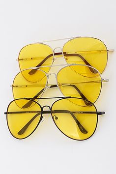 Big '70s vibes with theses yellow lens sunglasses and oversized frame Approx. size: 2.2" x 6" Metal frame Tinted Aviator Sunglasses, Yellow Lens Sunglasses, Greek Pantheon, Black Aviator Sunglasses, Gold Aviator Sunglasses, 70s Vibes, Rose Gold Sunglasses, Rose Gold Frame, Tinted Sunglasses