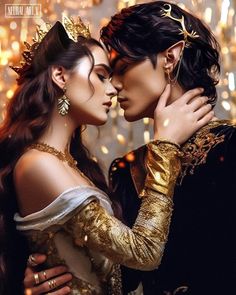 two people are dressed in costumes and one is kissing the other's foreheads