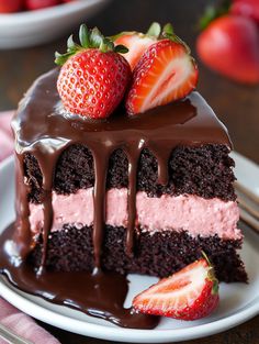 a piece of chocolate cake with strawberries on top