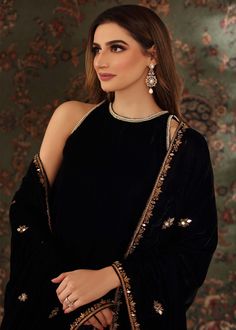 Black velvet halter neck shirt handworked with resham, dabka, tilla and zardozi on the neckline, sleeves and at the back. Paired with black flared pants. Can be paired with black velvet Shawl all handworked with resham, dabka, zardozi and mirrorwork details Velvet Indian Outfits, Velvet Dress Indian, Velvet Kurti Design, Black Saree Party Wear, Halter Neck Shirt, Black Velvet Shawl, Velvet Pakistani Dress, Multi Dupatta, Black Velvet Suit