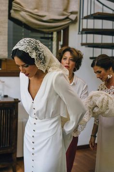 the bride is getting ready to walk down the aisle