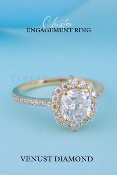 the engagement ring with an oval cut diamond surrounded by round brilliant pave diamonds in yellow gold