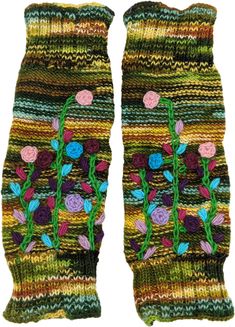 A warm and cozy unisex winter leg warmers with jungle sunset vibes.  These easy-to-wear, comfortable pure wool leg warmers are one-size-fits-all, and can be used by both men and women. #tlb #bohogift #Fall #Floral #Handmade #WoolLegWarmer #UnisexLegWarmer Casual Winter Festival Leg Warmers, Winter Festival Leg Warmers, Casual Multicolor Knitted Leg Warmers, Casual Green Leg Warmers For Fall, Handmade Green Socks For Winter, Multicolor Knitted Leg Warmers For Winter, Cozy Multicolor Knitted Leg Warmers, Multicolor Knitted Leg Warmers For Fall, Cozy Knitted Multicolor Leg Warmers