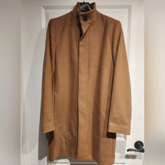 Theory Men's Belvin Modus Melton Wool Coat In Camel (Tan), Medium Wool/Cashmere Nwt Fits Slim Stand Collar Long Sleeves Hidden Button Placket Front Side Slip Pocket 66% Wool 5% Cashmere 4% Elastane 25% Polyamide Camel Long Sleeve Business Outerwear, Camel Business Outerwear, Formal Camel Outerwear For Fall, Formal Brown Outerwear With Stand Collar, Navy Overcoat, Full Length Coat, Button Fashion, Lapel Coat, Mens Black Jacket