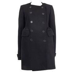 100% authentic Rochas collarless peacoat in black virgin wool (75%), nylon (15%), and cashmere (10%). With bell-shaped gathered waist, pleated back, two flap pockets on the sides, and buttoned cuff straps. Closes with black buttons on the front. Lined in black rayon (100%) featuring one buttoned inside slit pocket. Has been worn and is in excellent condition. Measurements Tag Size 44 Size L Shoulder Width 38cm (14.8in) Bust 94cm (36.7in) to 102cm (39.8in) Waist 90cm (35.1in) to 94cm (36.7in) Hip Black Button, Puffer Coat, Black Wool, Double Breasted, Wool Blend, Coats Jackets, Cashmere, Sleeve Length, Fashion Outfits