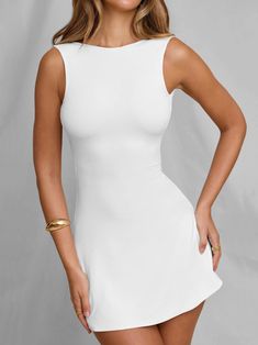 Get ready to turn heads in the Menlo Open Back Sleeveless Mini Dress! This gorgeous white dress features a stylish open back design and sleeveless cut, perfect for showing off your summer tan. This dress is sure to make a statement and add some playful flair to your wardrobe. Size Guide: Model is 5’6” tall, and has a 32.8” bust, 25.8” waist, & 35.2” hips. She is wearing a S / US 4 / AU 8. This dress is true to size. Material: 95% Polyester. 5% Spandex. Feature: High Neckline. Mini length. Sleeveless. Open Back. Stretchy Fabrication. Not Lined. Fitted. Care Instructions: Machine wash / Cold hand wash Summer Tan, Elegant Black Dress, Summer Tanning, Sleeveless Mini Dress, Back Design, White Mini Dress, High Neckline, Mini Black Dress, Open Back