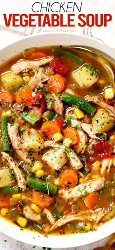 chicken vegetable soup in a white bowl