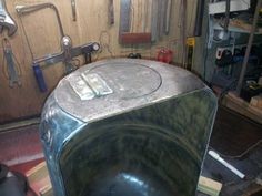 a large metal object sitting inside of a garage