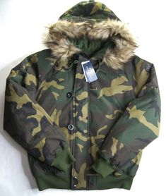 Camouflage Outdoor Outerwear With Detachable Hood, Urban Camouflage Outerwear With Adjustable Hood, Camouflage Hooded Outerwear With Detachable Hood, Military-style Green Hooded Jacket With Adjustable Hood, Military Style Green Hooded Jacket With Adjustable Hood, Green Military Hooded Jacket With Adjustable Hood, Camouflage Outerwear With Double-lined Hood For Outdoor, Camouflage Winter Outerwear With Adjustable Hood, Winter Camouflage Outerwear With Fleece Lining