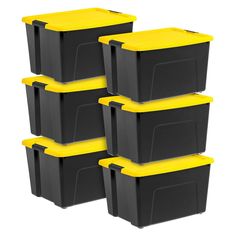 six black and yellow storage bins stacked on top of each other, with the lids closed