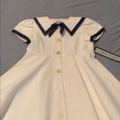 Adorable Sailor Dress Size 5 Runs Big Would Make A Great Costume Beautiful Material Classic Short Sleeve Dress For Dress-up, Fitted Short Sleeve Dress For School, Preppy Short Sleeve Dresses For School, Preppy Short Sleeve School Dress, Preppy Fitted White Dress, Summer Short Sleeve School Uniform Dress, Summer School Uniform Dress With Short Sleeves, Fitted Short Sleeve School Uniform Dresses, Classic Cotton Dresses For Dress-up