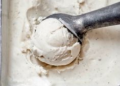 a scoop of ice cream in a metal pan