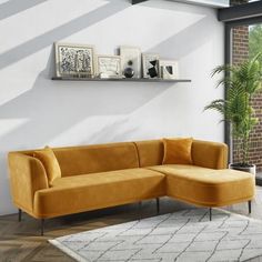 a living room scene with focus on the corner sofa